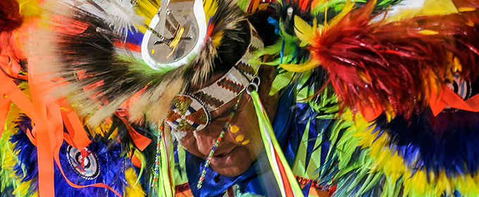 image of dancer performing at an Native American Heritage Ceremony.