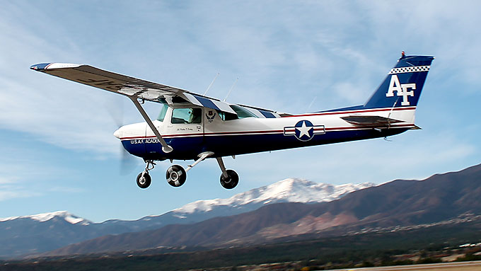 Image of USAF Academy T-51 in flight